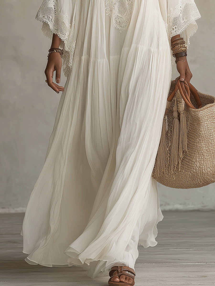 Celeste | Lange jurk van ivoorkleurig chiffon met vleermuismouwen en wit kant