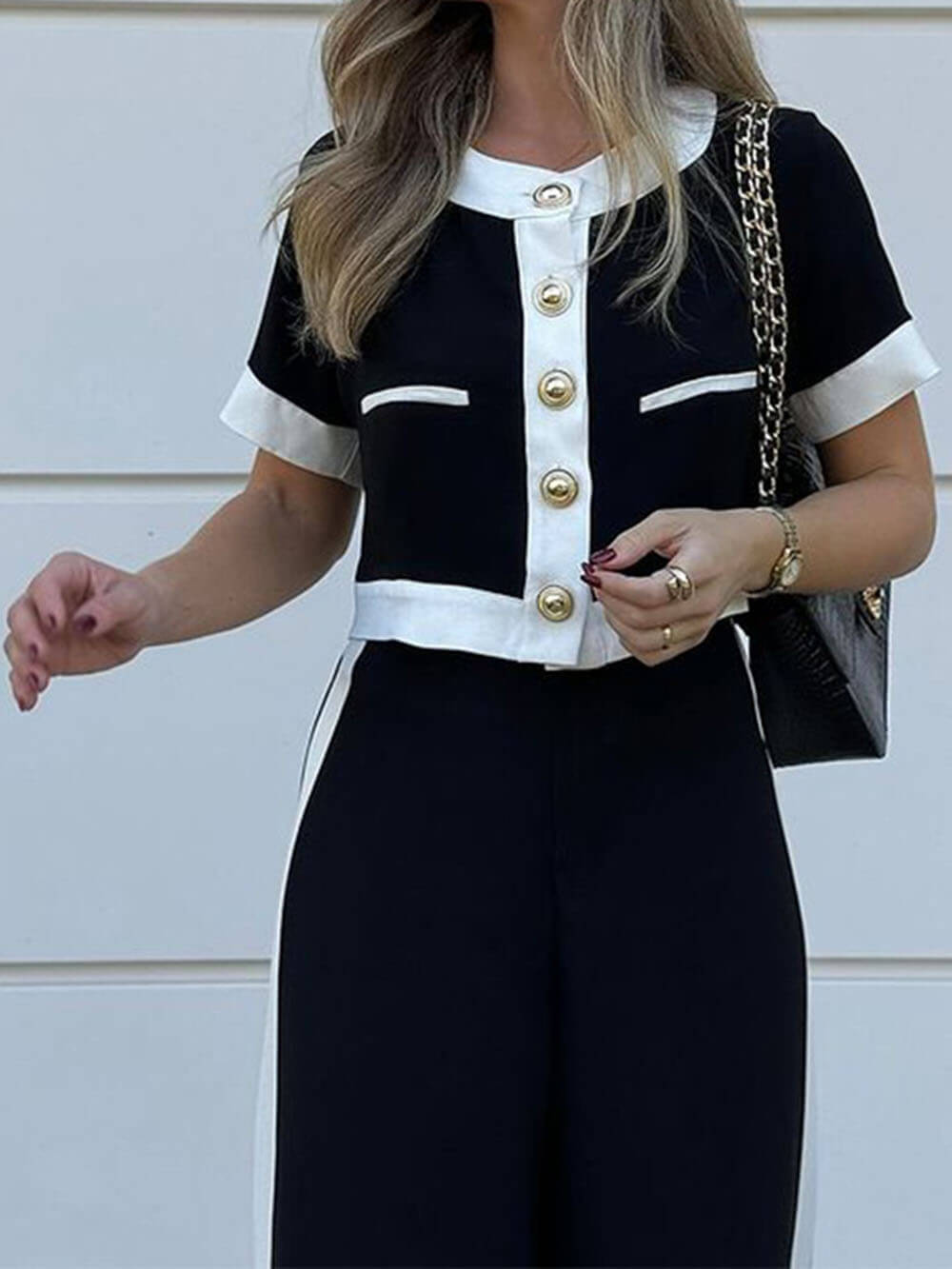 Modieuze Zwart-Wit Patchwork Korte Mouwen Top En Rechte Broek Set