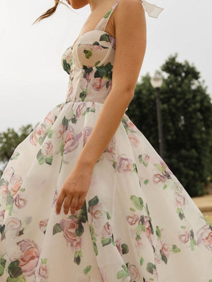 Tedere bloemen midi jurk met strikbandjes