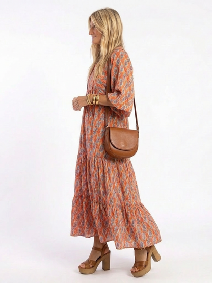 Amara | Midi-jurk met V-hals en geometrisch patroon