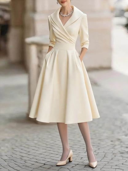 Elegante V-hals Midi Jurk met Lange Mouwen