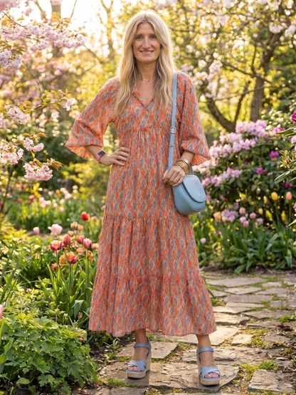 Amara | Midi-jurk met V-hals en geometrisch patroon