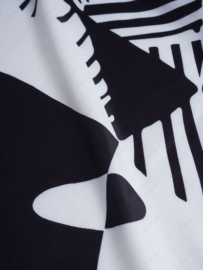 Trendy broekenset met losse wijde pijpen en graffitiprint