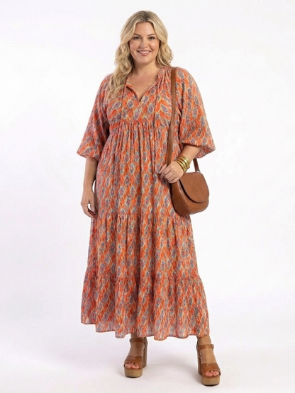 Amara | Midi-jurk met V-hals en geometrisch patroon