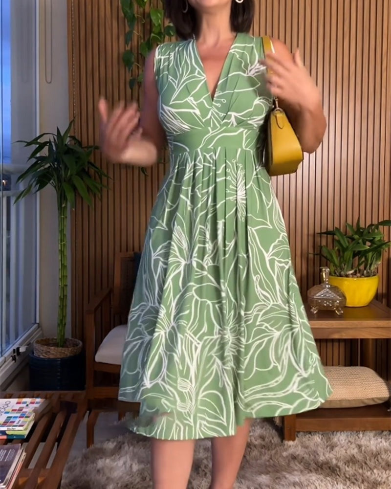 Mouwloze jurk met V-hals en getailleerde taille