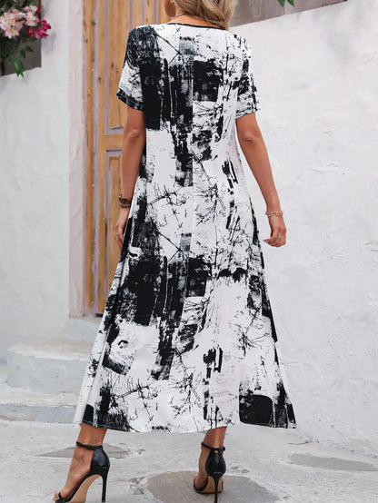 Noëlle | Zwart-Witte Maxi Jurk met Abstracte Print