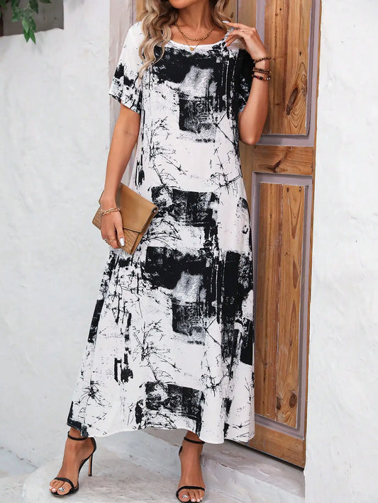 Noëlle | Zwart-Witte Maxi Jurk met Abstracte Print