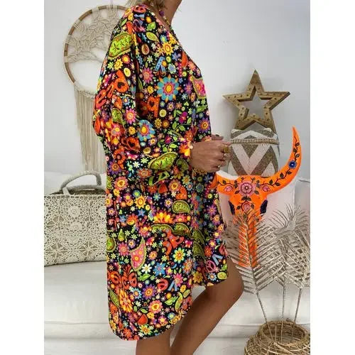 Elegante Damesjurk met V-Hals en Print