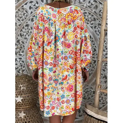 Elegante Damesjurk met V-Hals en Print