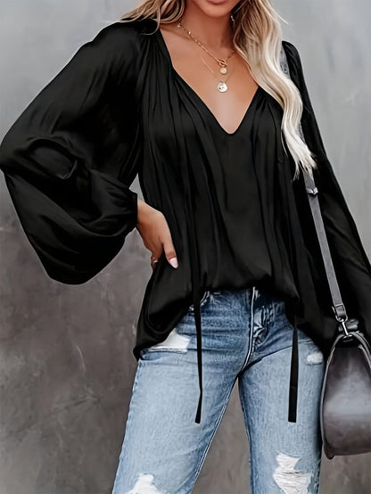 V-Hals Blouse met Strik - Lantaarnmouwen en Drapé Ontwerp