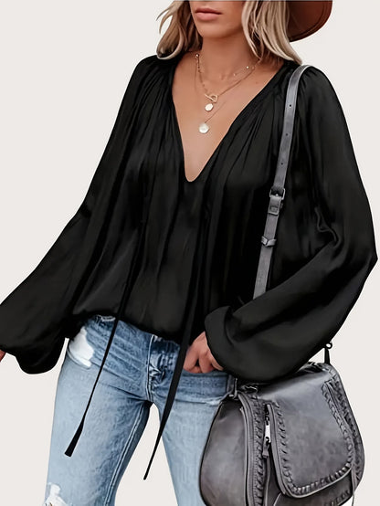 V-Hals Blouse met Strik - Lantaarnmouwen en Drapé Ontwerp