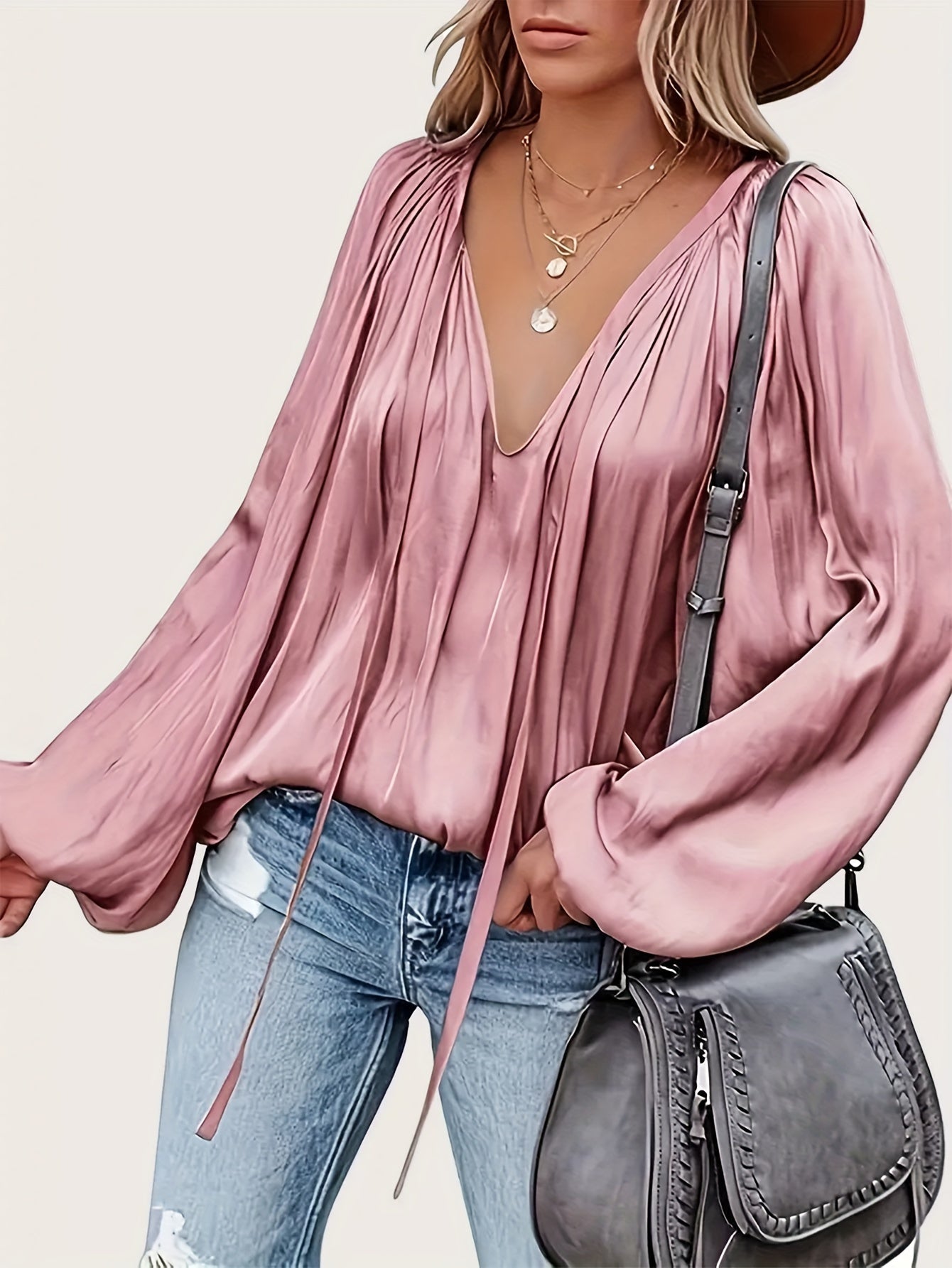 V-Hals Blouse met Strik - Lantaarnmouwen en Drapé Ontwerp