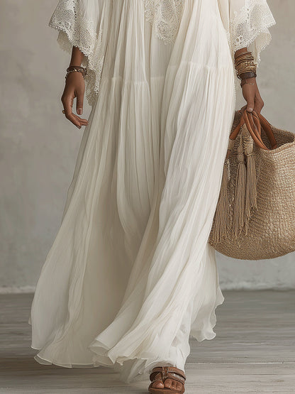 Celeste | Lange jurk van ivoorkleurig chiffon met vleermuismouwen en wit kant