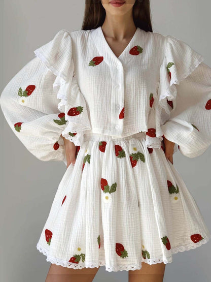 Casual tweedelige set met korte rok en ruches