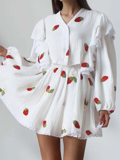 Casual tweedelige set met korte rok en ruches
