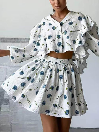Casual tweedelige set met korte rok en ruches