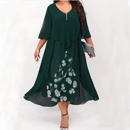 Asymmetrische mousselinejurk met tweedelig effect – halflange mouwen