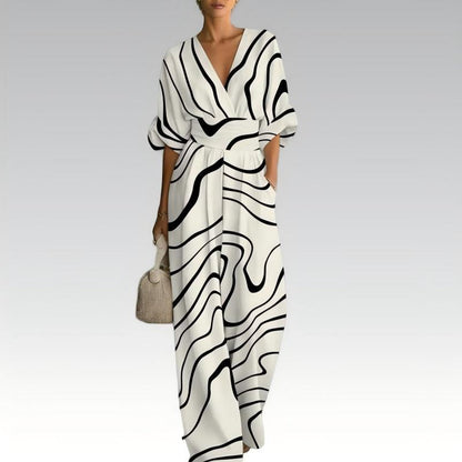 Sinem - Elegante jumpsuit met print en V-hals