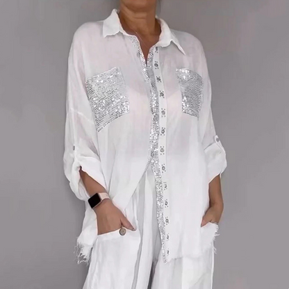 Set bestaande uit een shirt met pailletten en een broek met wijde pijpen voor dames