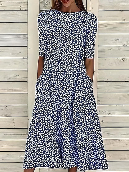Sela™ – Zomerse Midi-jurk met elegante bloemenprint